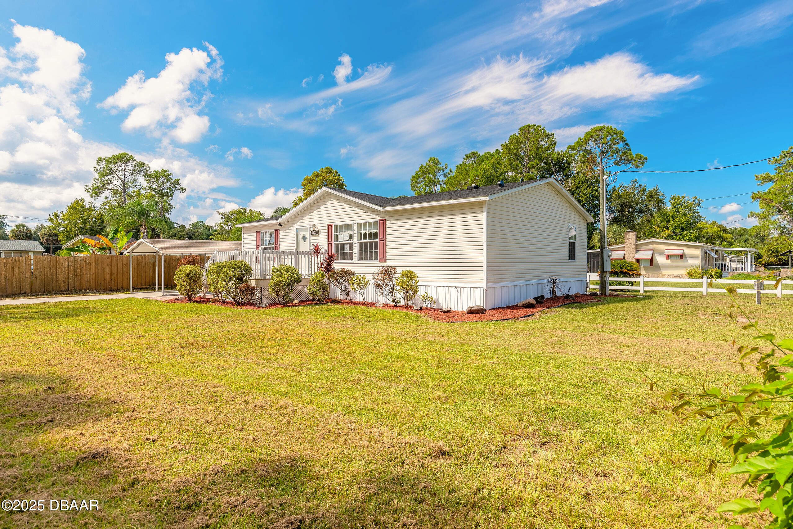 55721 Palmetto Road Astor, FL 32102 - Photo 4 of 27 a view of a house with a yard