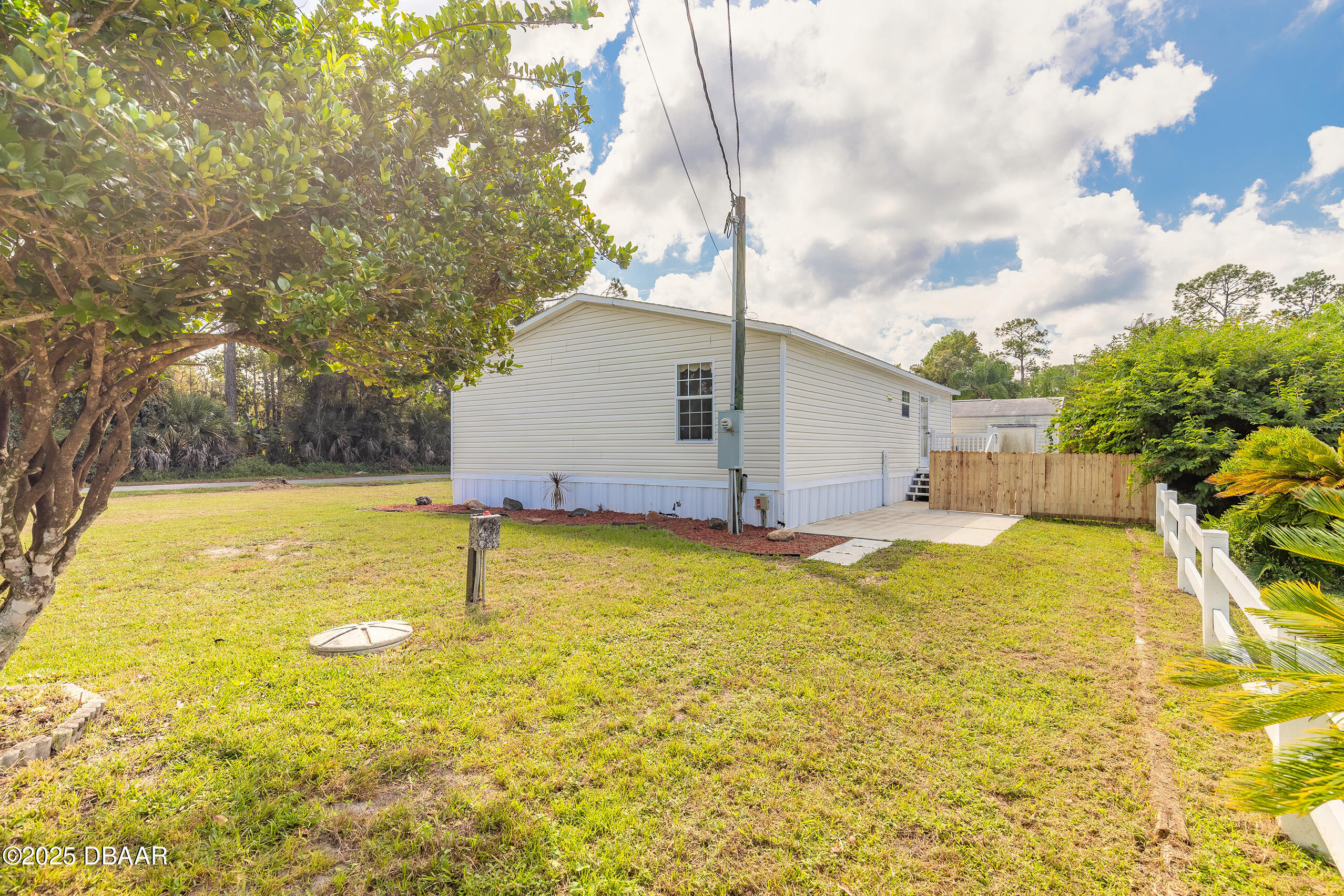 55721 Palmetto Road Astor, FL 32102 - Photo 5 of 27 a view of an outdoor space and swimming pool