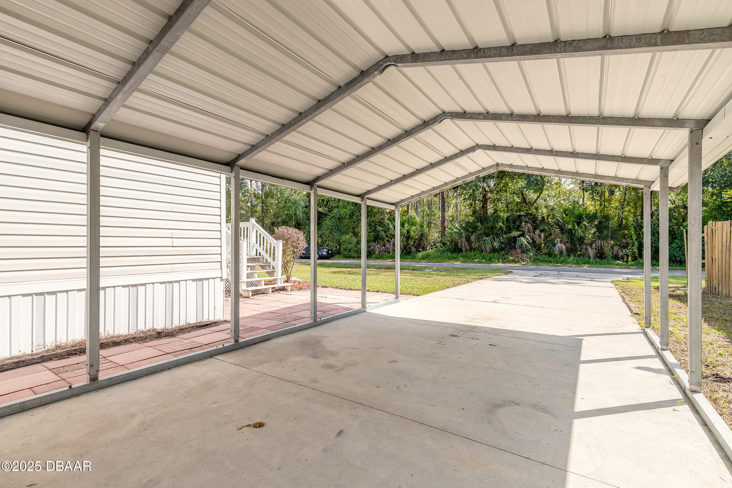 55721 Palmetto Road Astor, FL 32102 - Photo 6 of 27 a view of a backyard