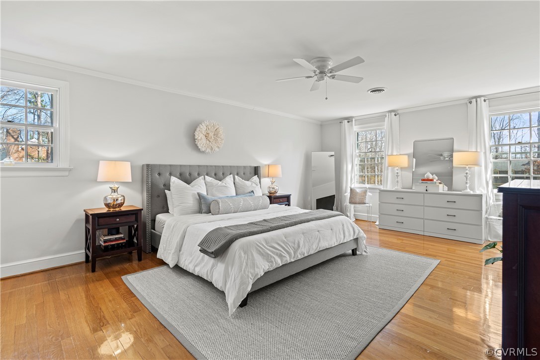 2330 Wadebridge Road Midlothian, VA 23113 - Photo 26 of 47 a bedroom with a large bed and a chandelier