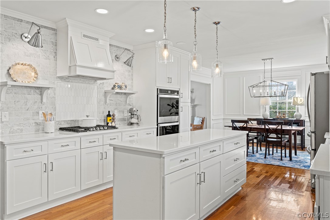 2330 Wadebridge Road Midlothian, VA 23113 - Photo 8 of 47 a large kitchen with white cabinets and stainless steel appliances