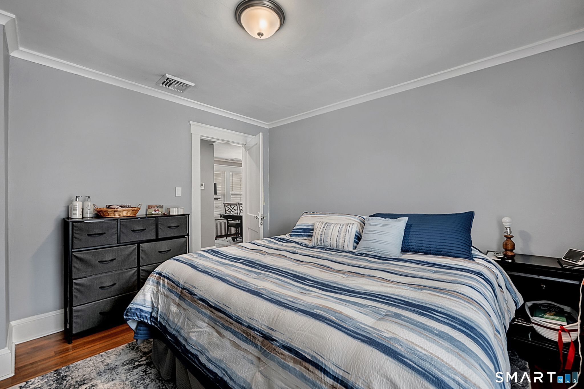 64 Cooper Street Torrington, CT 06790 - Photo 15 of 26 a bedroom with a bed and a closet