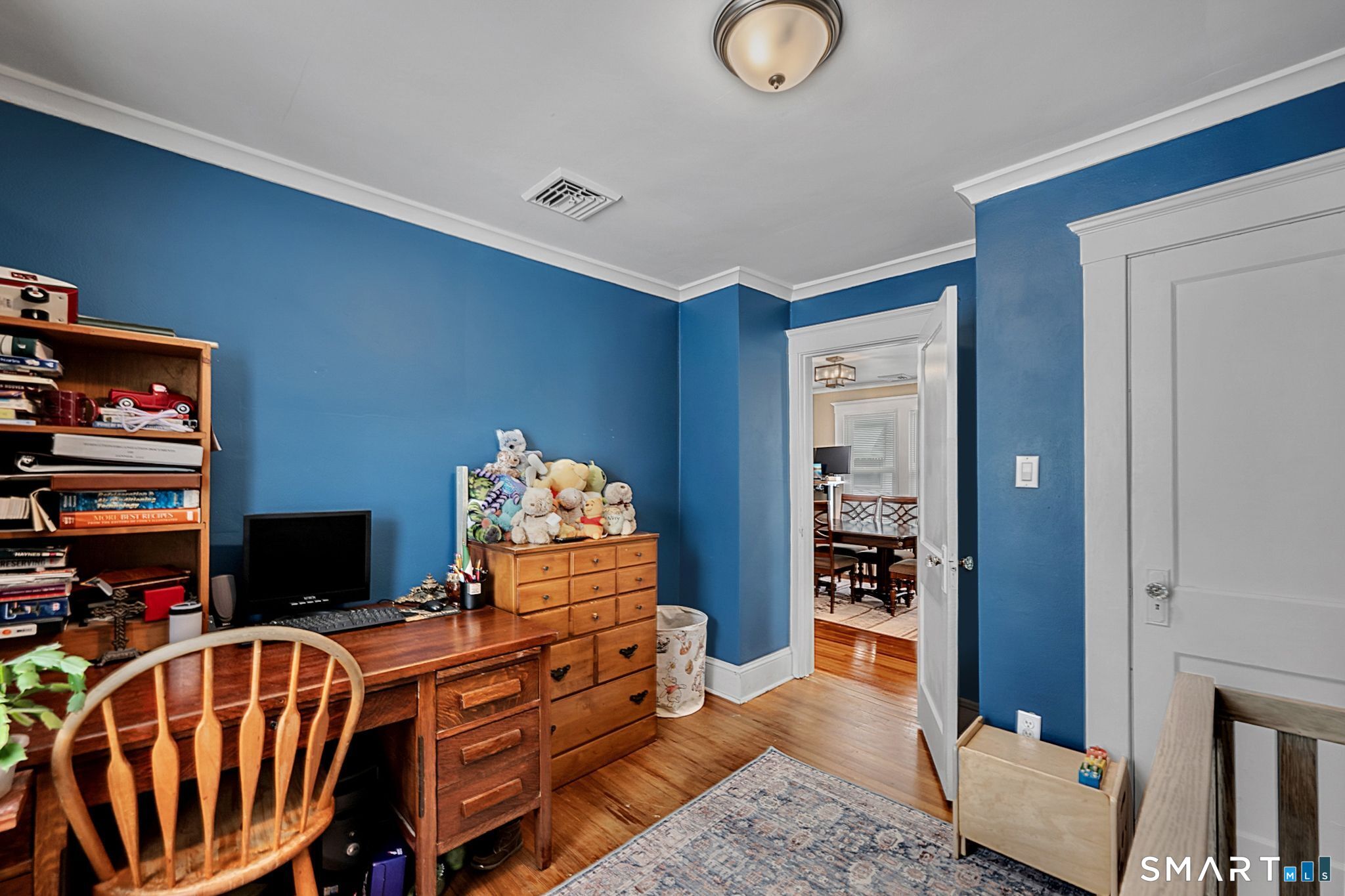 64 Cooper Street Torrington, CT 06790 - Photo 17 of 26 a living room with furniture fireplace and flat screen tv