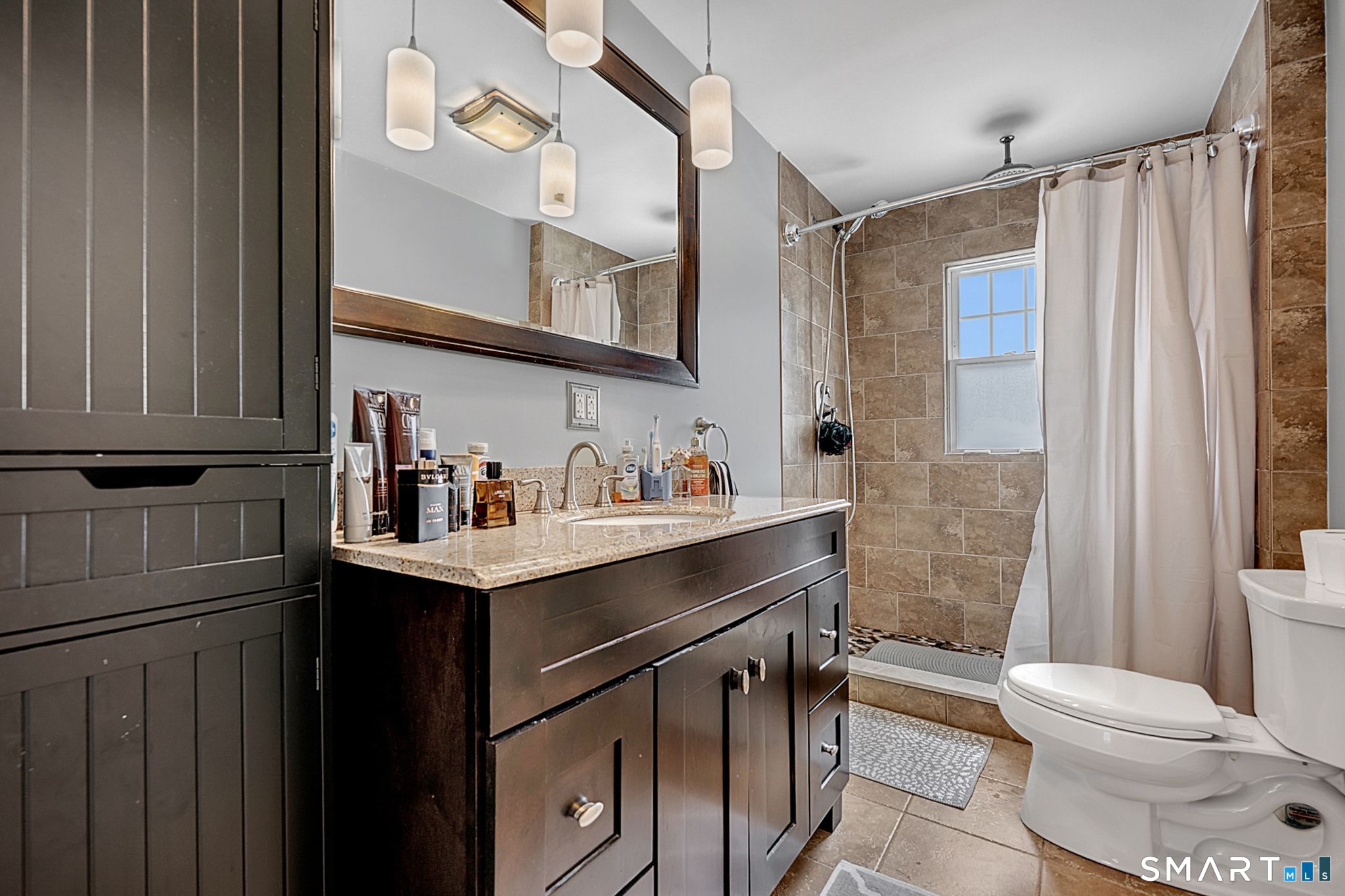 64 Cooper Street Torrington, CT 06790 - Photo 18 of 26 a bathroom with a sink toilet and shower