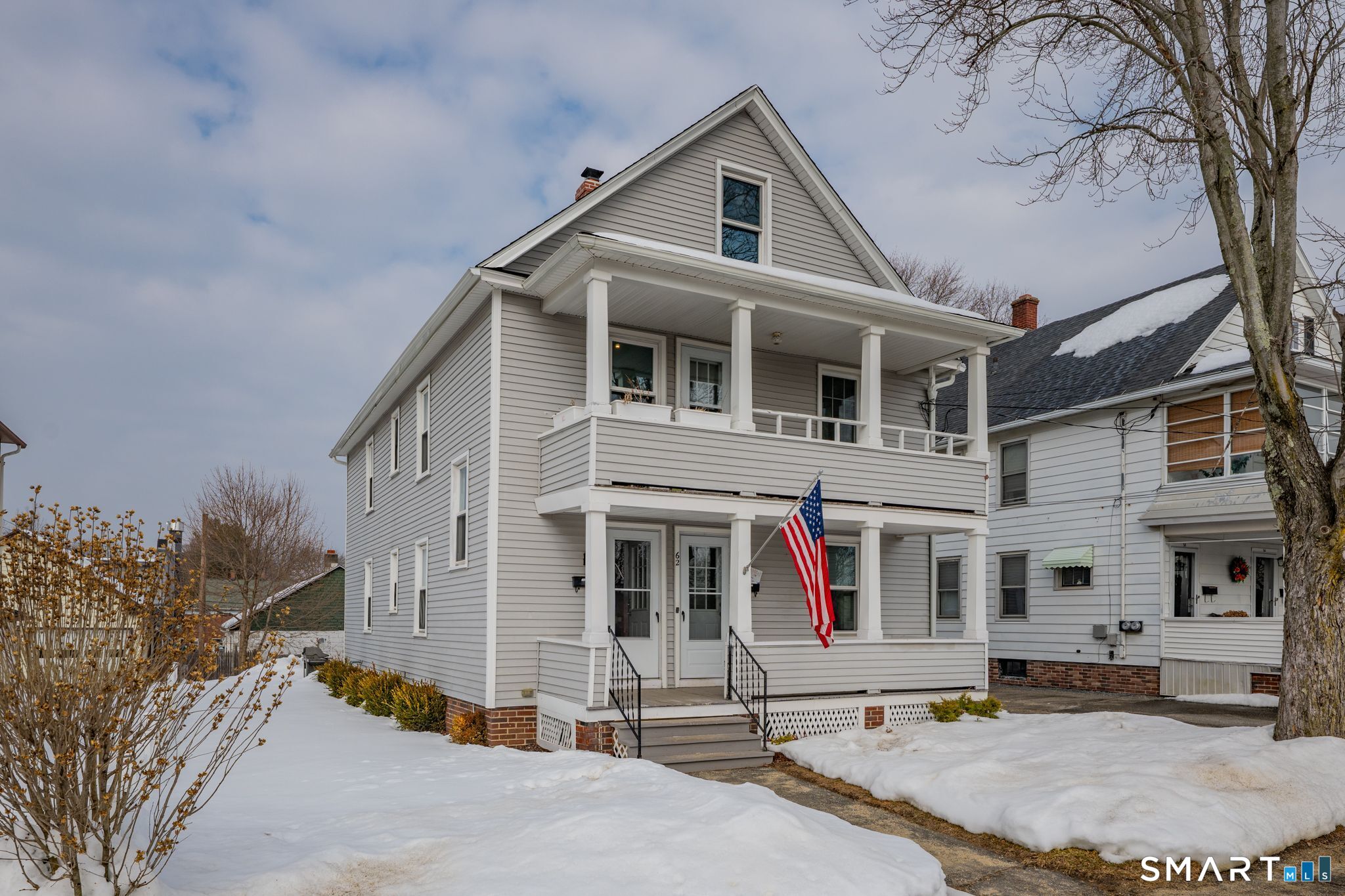 64 Cooper Street Torrington, CT 06790 - Photo 20 of 26 a front view of a house with a yard