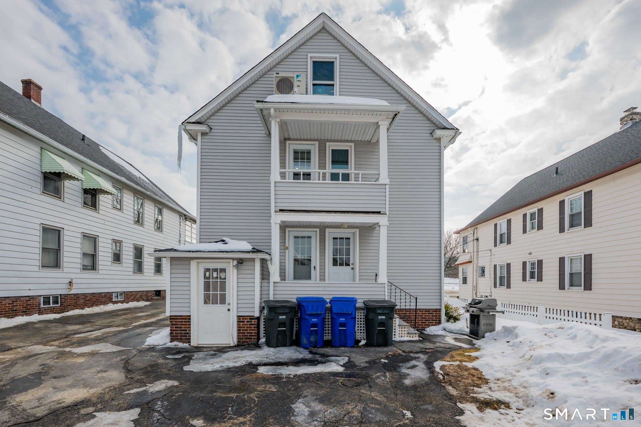 64 Cooper Street Torrington, CT 06790 - Photo 25 of 26 a front view of a house with a yard
