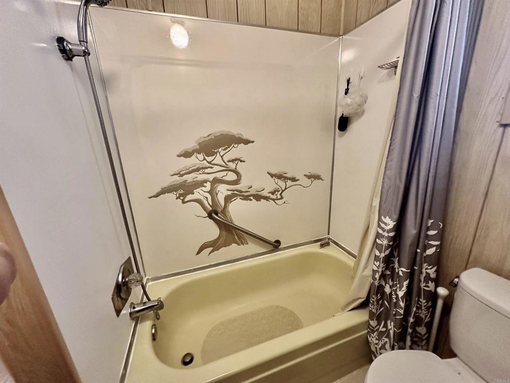 8301 Mission Gorge Road, Unit 194 Santee, CA 92071 - Photo 28 of 61 a bathroom with a shower and a toilet