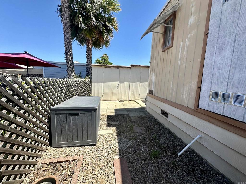 8301 Mission Gorge Road, Unit 194 Santee, CA 92071 - Photo 43 of 61 a view of a house with a patio