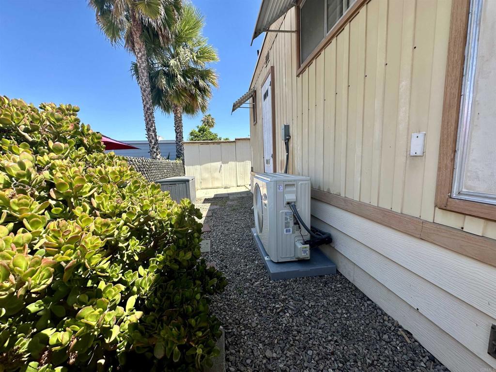 8301 Mission Gorge Road, Unit 194 Santee, CA 92071 - Photo 44 of 61 a house with trees in front of it