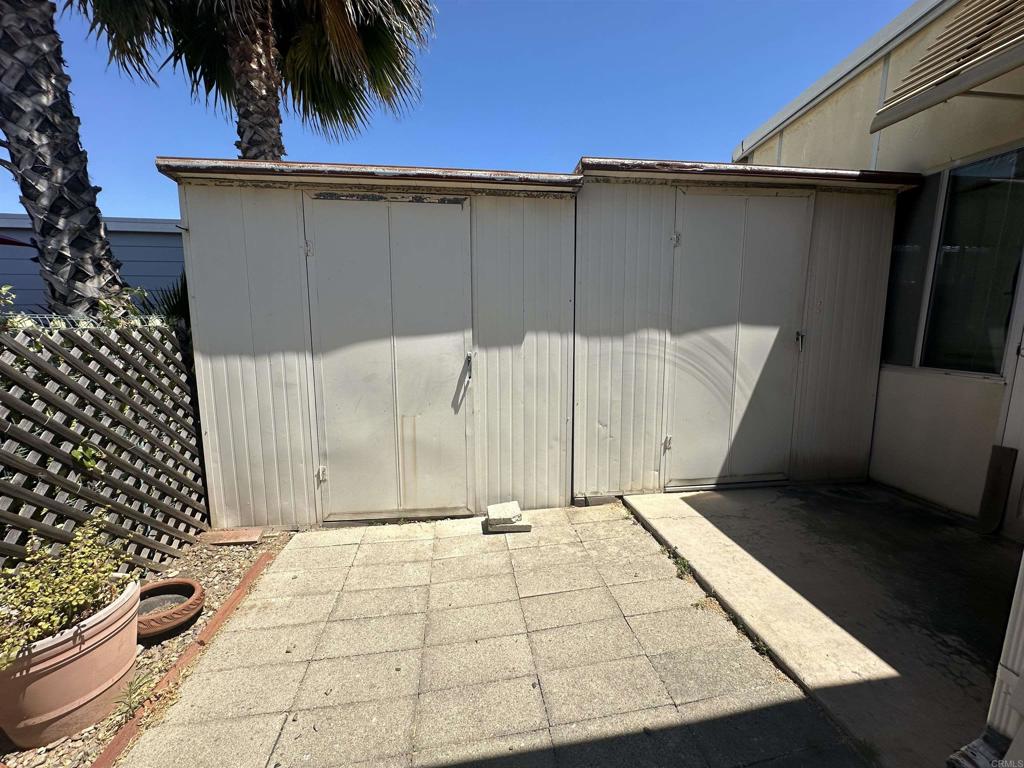 8301 Mission Gorge Road, Unit 194 Santee, CA 92071 - Photo 48 of 61 a view of outdoor space with a car parked
