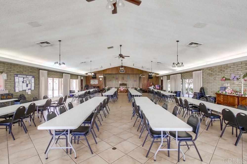 8301 Mission Gorge Road, Unit 194 Santee, CA 92071 - Photo 50 of 61 a view of a dining room with furniture window and wooden floor