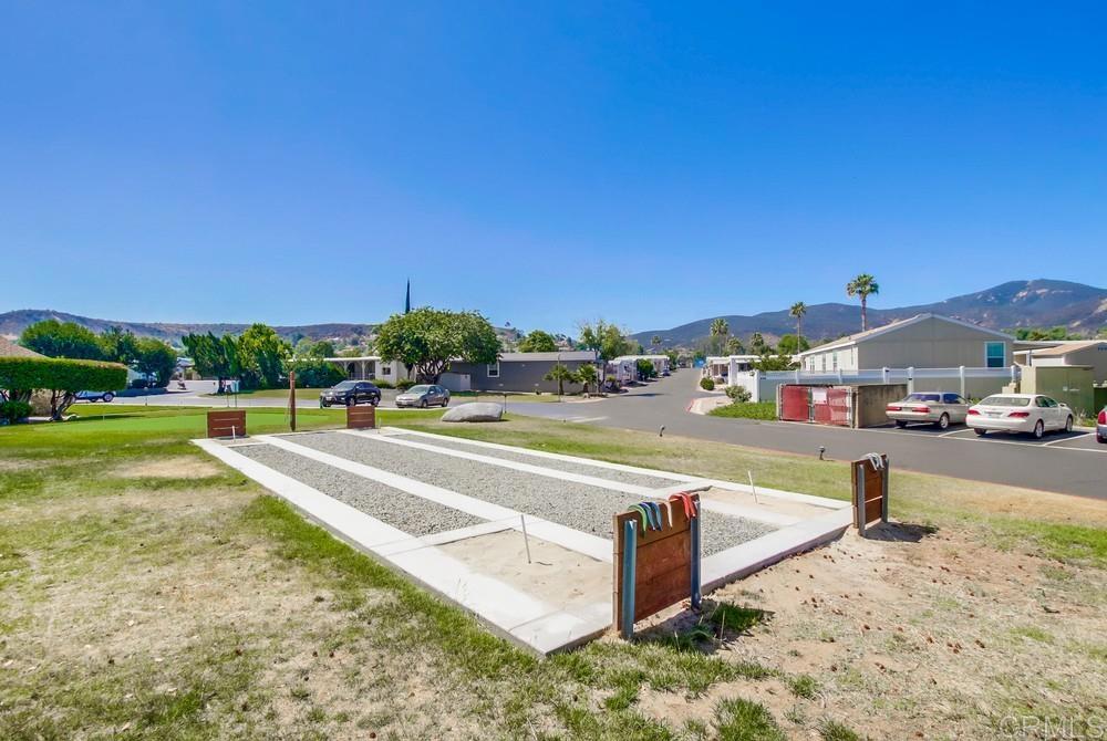 8301 Mission Gorge Road, Unit 194 Santee, CA 92071 - Photo 52 of 61 a view of swimming pool and outdoor seating