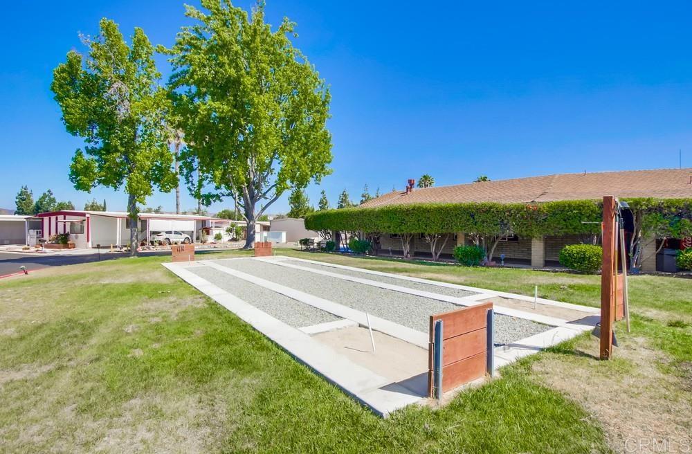 8301 Mission Gorge Road, Unit 194 Santee, CA 92071 - Photo 57 of 61 a view of a house with pool