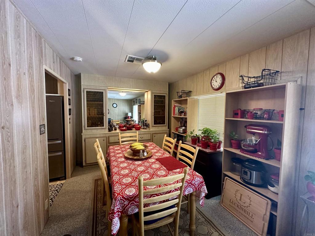 8301 Mission Gorge Road, Unit 194 Santee, CA 92071 - Photo 8 of 61 a outdoor dining space with furniture and outdoor view