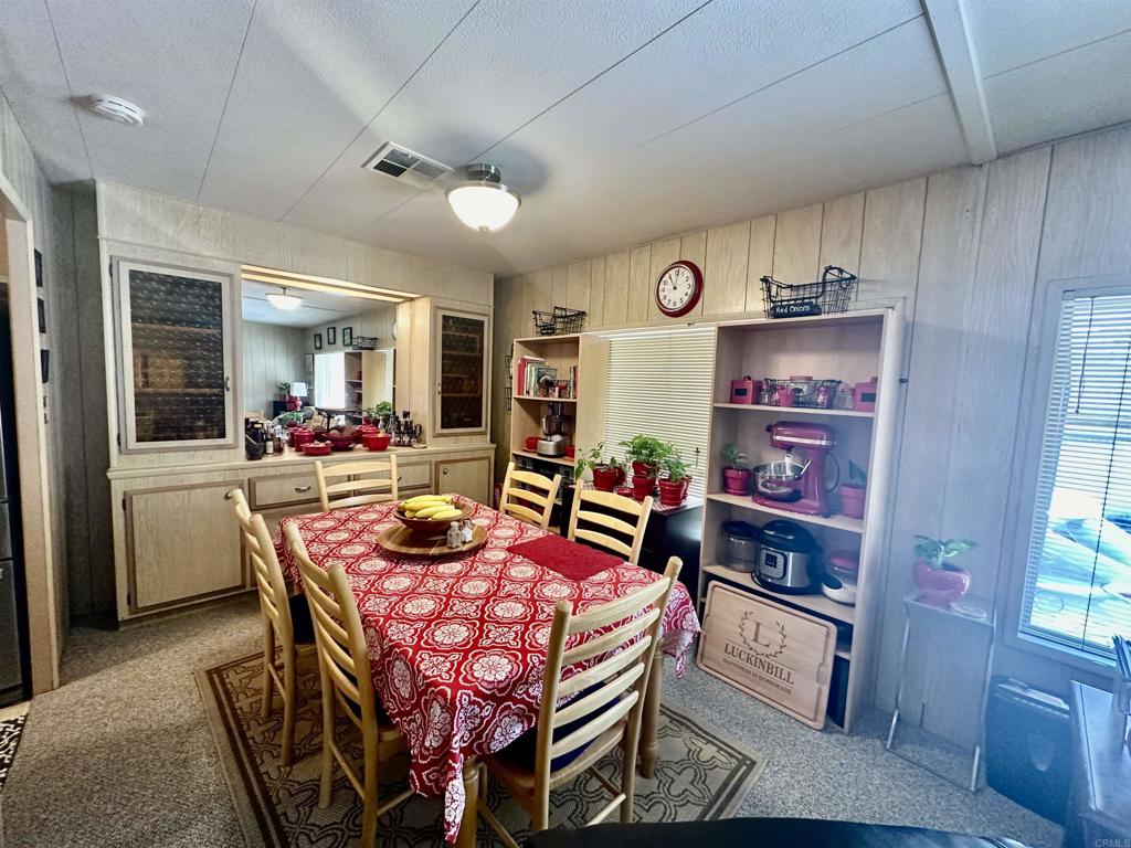 8301 Mission Gorge Road, Unit 194 Santee, CA 92071 - Photo 9 of 61 a dining room with furniture and window