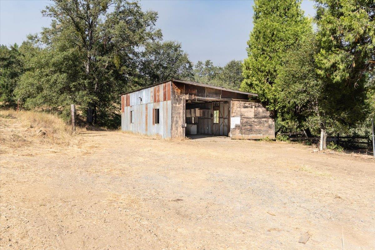 8260 Fairplay Road Somerset, CA 95684 - Photo 14 of 27 Garage/ Shop building nice concrete flooring