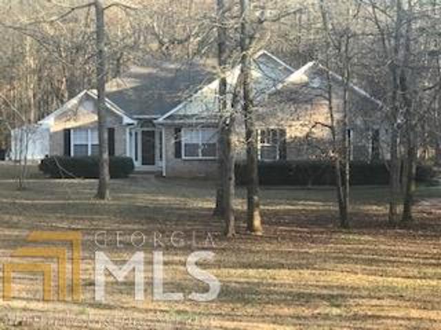 129 Belle Springs Road Athens, GA 30607 - Photo 1 of 1 a backyard of a house