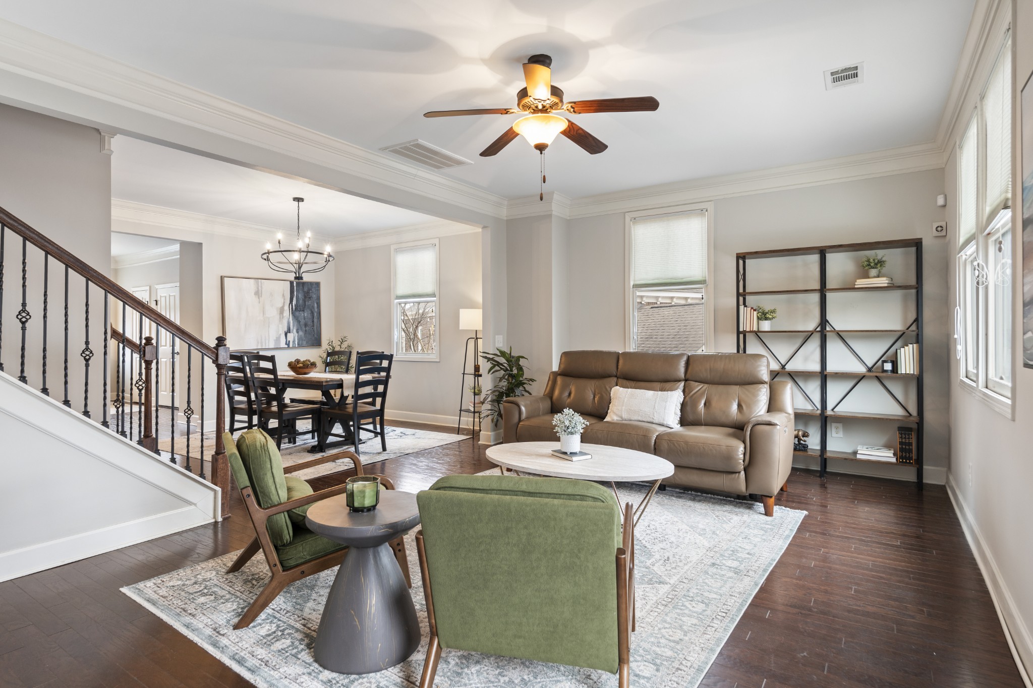 2069 Rural Plains Circle Franklin, TN 37064 - Photo 11 of 74 a living room with furniture and a chandelier
