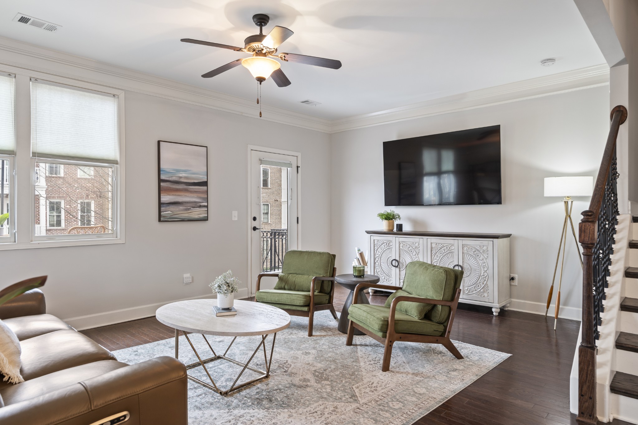 2069 Rural Plains Circle Franklin, TN 37064 - Photo 14 of 74 a living room with furniture a flat screen tv and a window