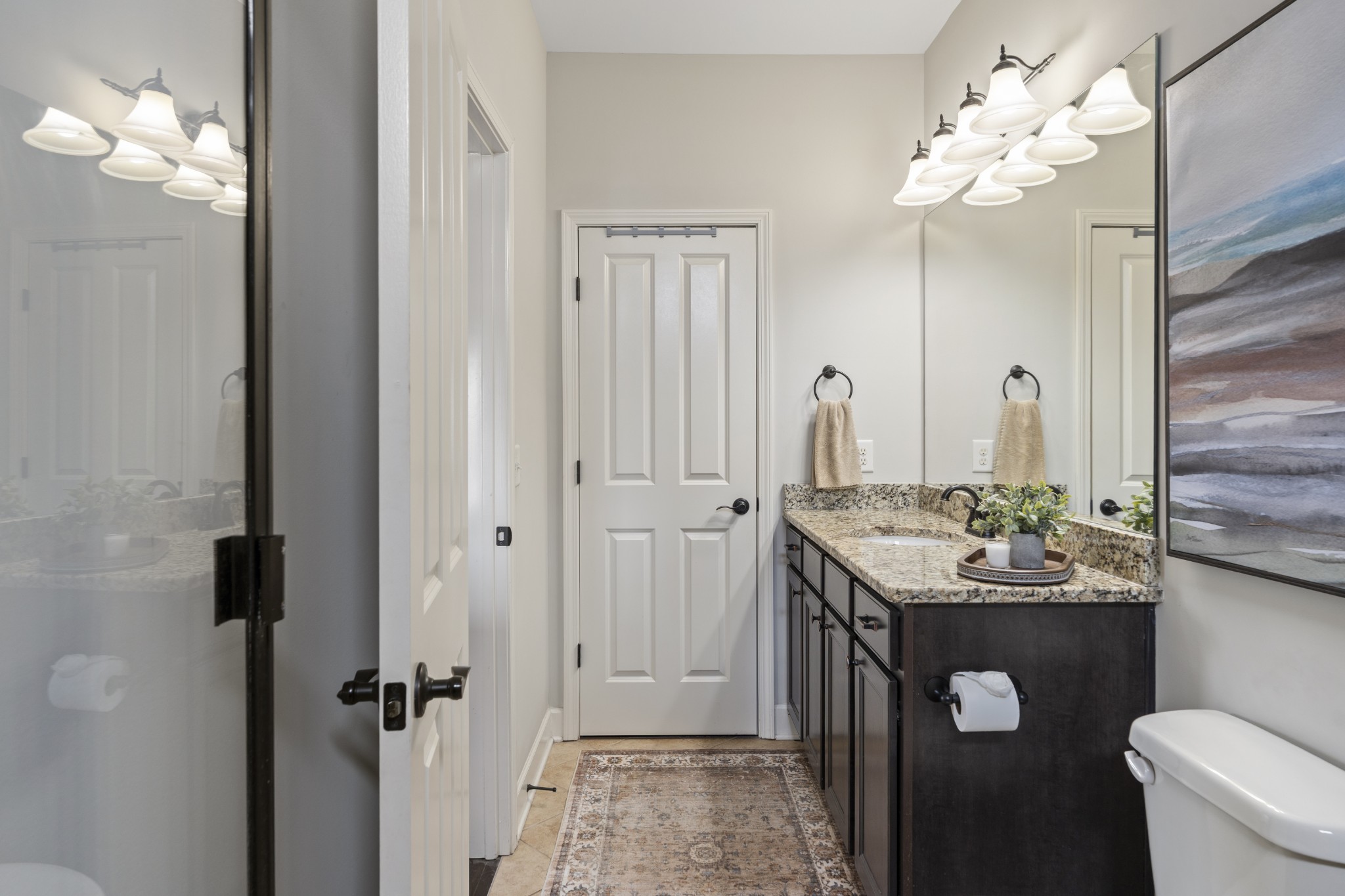 2069 Rural Plains Circle Franklin, TN 37064 - Photo 18 of 74 a bathroom with a double vanity sink mirror and toilet