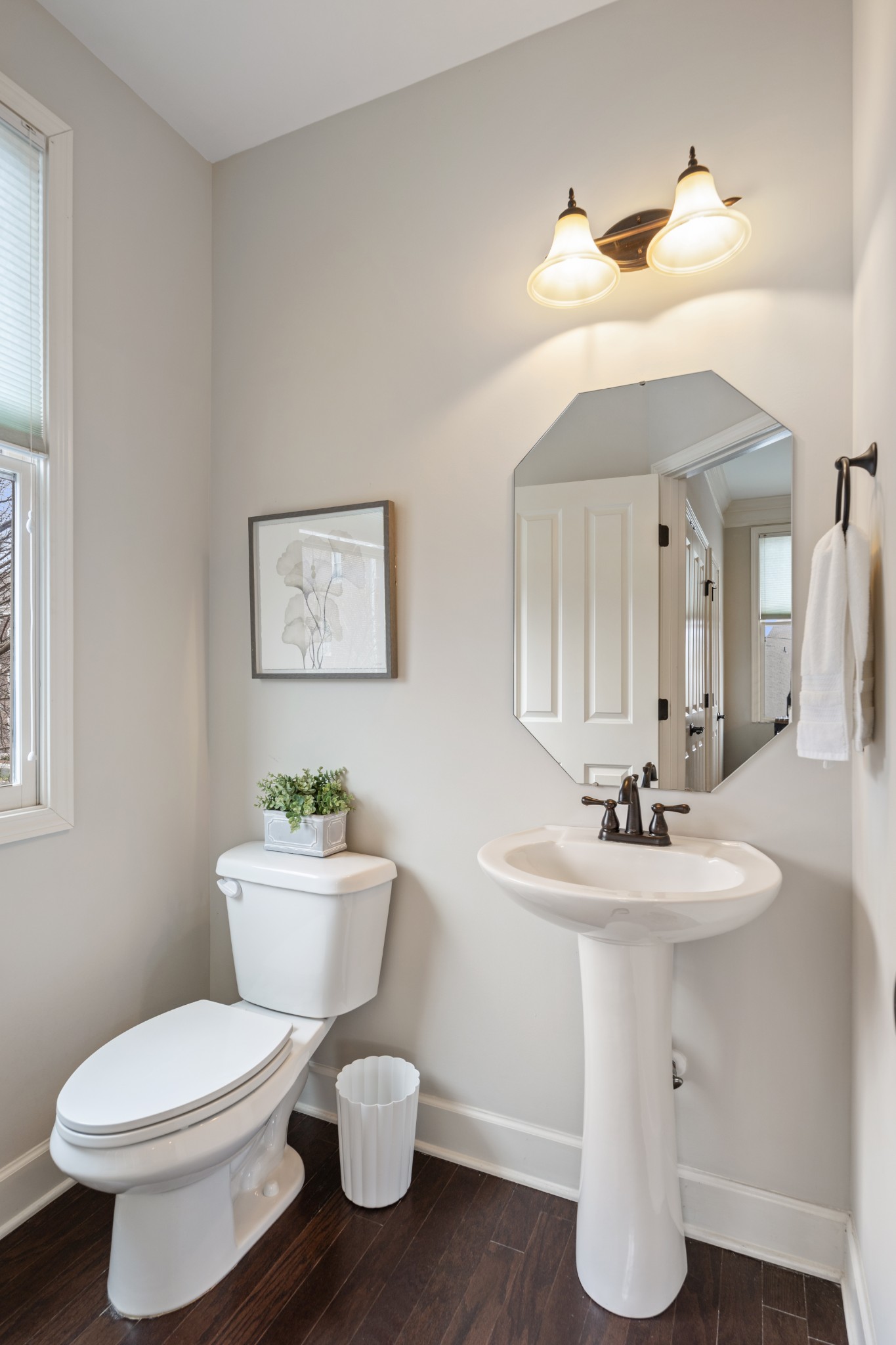2069 Rural Plains Circle Franklin, TN 37064 - Photo 20 of 74 a bathroom with a toilet sink and a mirror