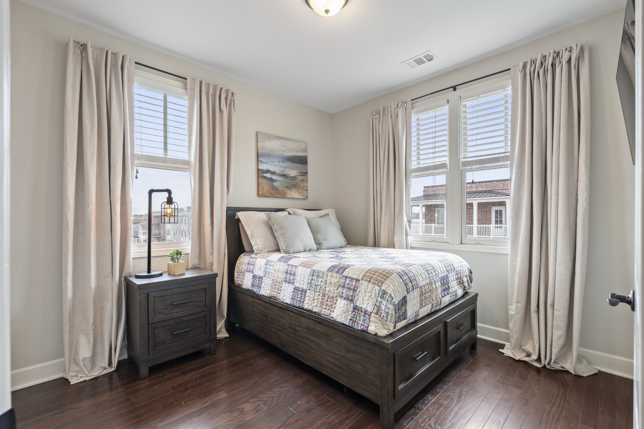 2069 Rural Plains Circle Franklin, TN 37064 - Photo 25 of 74 a bed sitting in a bedroom next to a window