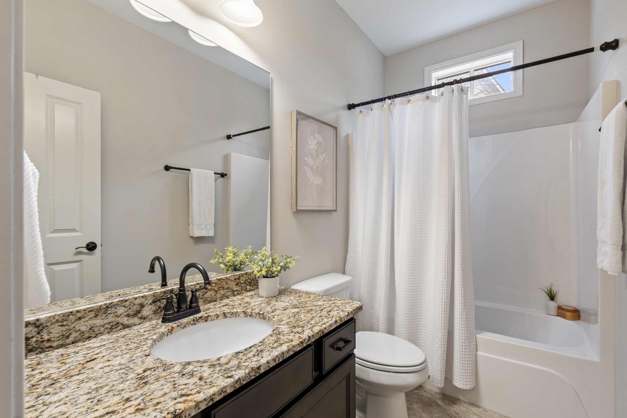 2069 Rural Plains Circle Franklin, TN 37064 - Photo 10 of 74 a bathroom with a granite countertop sink toilet and shower