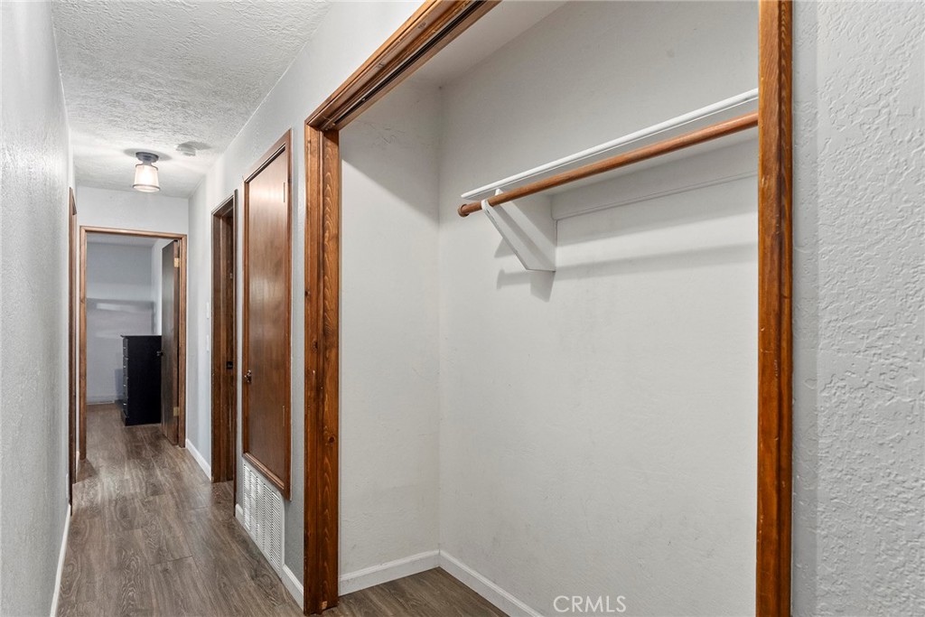 14177 Racine Circle Magalia, CA 95954 - Photo 17 of 52 a view of hallway with wooden floor