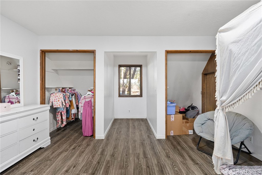 14177 Racine Circle Magalia, CA 95954 - Photo 30 of 52 a view of a hallway with wooden floor and closet