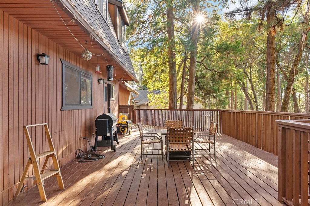 14177 Racine Circle Magalia, CA 95954 - Photo 40 of 52 a view of balcony with furniture and wooden floor