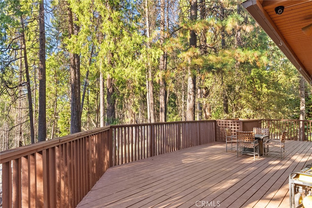 14177 Racine Circle Magalia, CA 95954 - Photo 41 of 52 a view of deck with wooden floor and outdoor seating