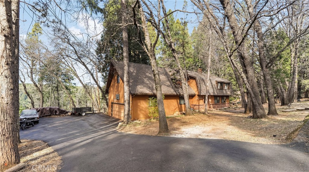 14177 Racine Circle Magalia, CA 95954 - Photo 5 of 52 a view of road with trees