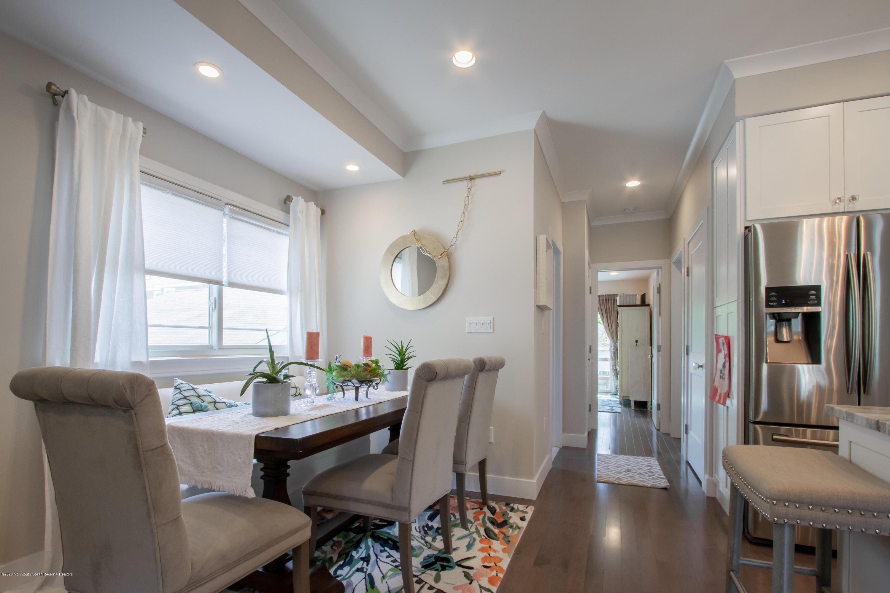 156 Spring Street Red Bank, NJ 07701 - Photo 8 of 26 a view of a dining room with furniture and a large window