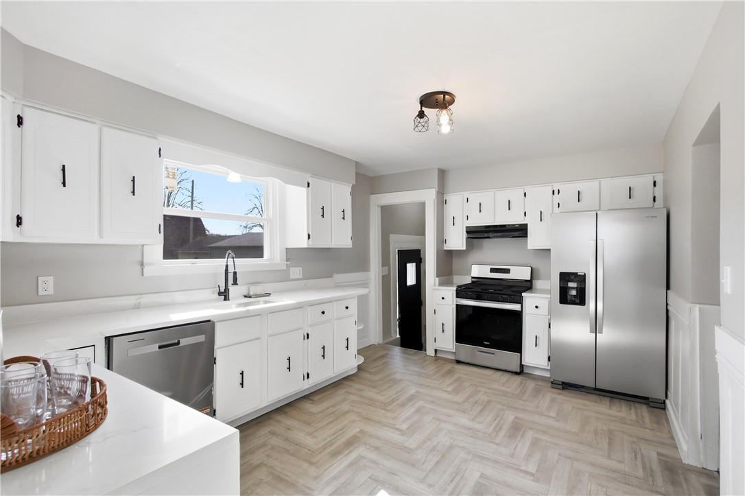 1925 Sunset Avenue Springfield, OH 45505 - Photo 18 of 45 This bright kitchen features modern appliances and ample counter space for culinary pursuits.