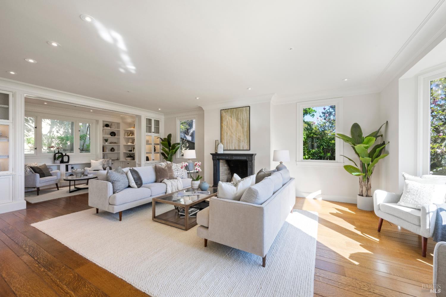 615 Sausalito Boulevard Sausalito, CA 94965 - Photo 12 of 45 a living room with fireplace furniture and a wooden floor