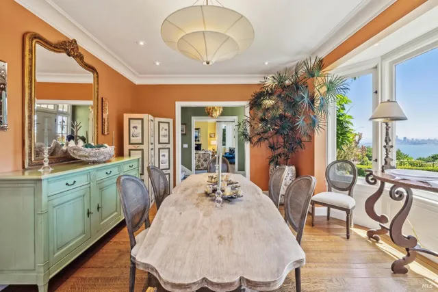 a view of a dining room with furniture window and outside view