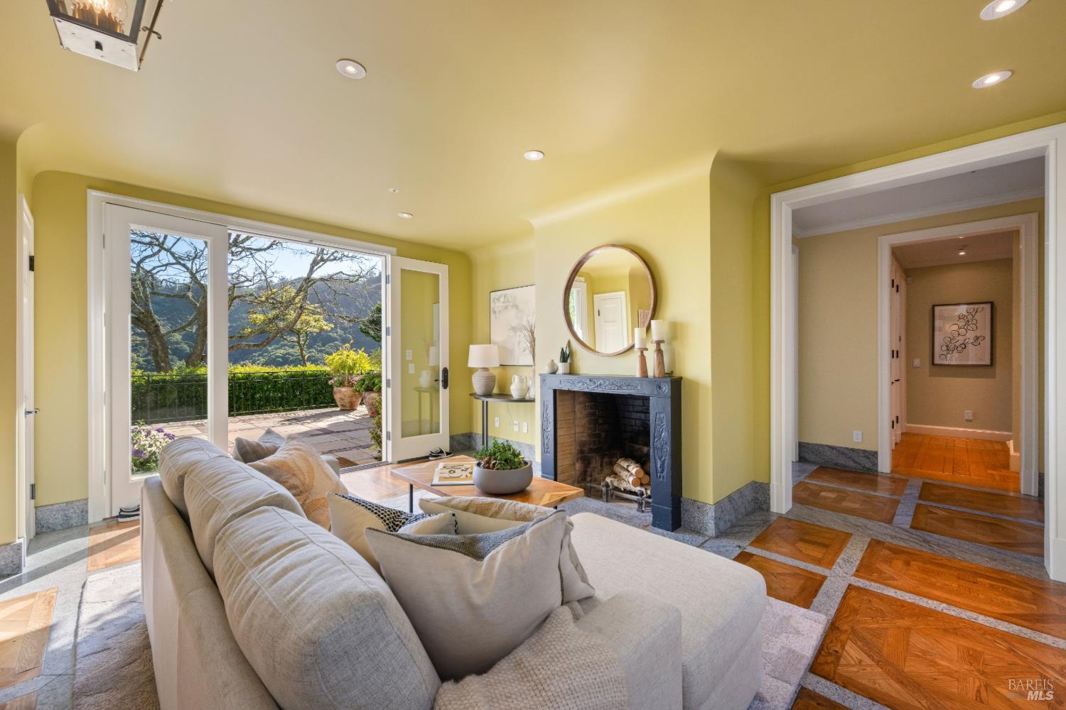 615 Sausalito Boulevard Sausalito, CA 94965 - Photo 19 of 45 a living room with furniture fireplace and a large window