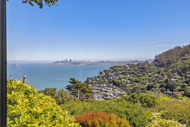 a spacious bathroom with a sink mirror and a bathtub
