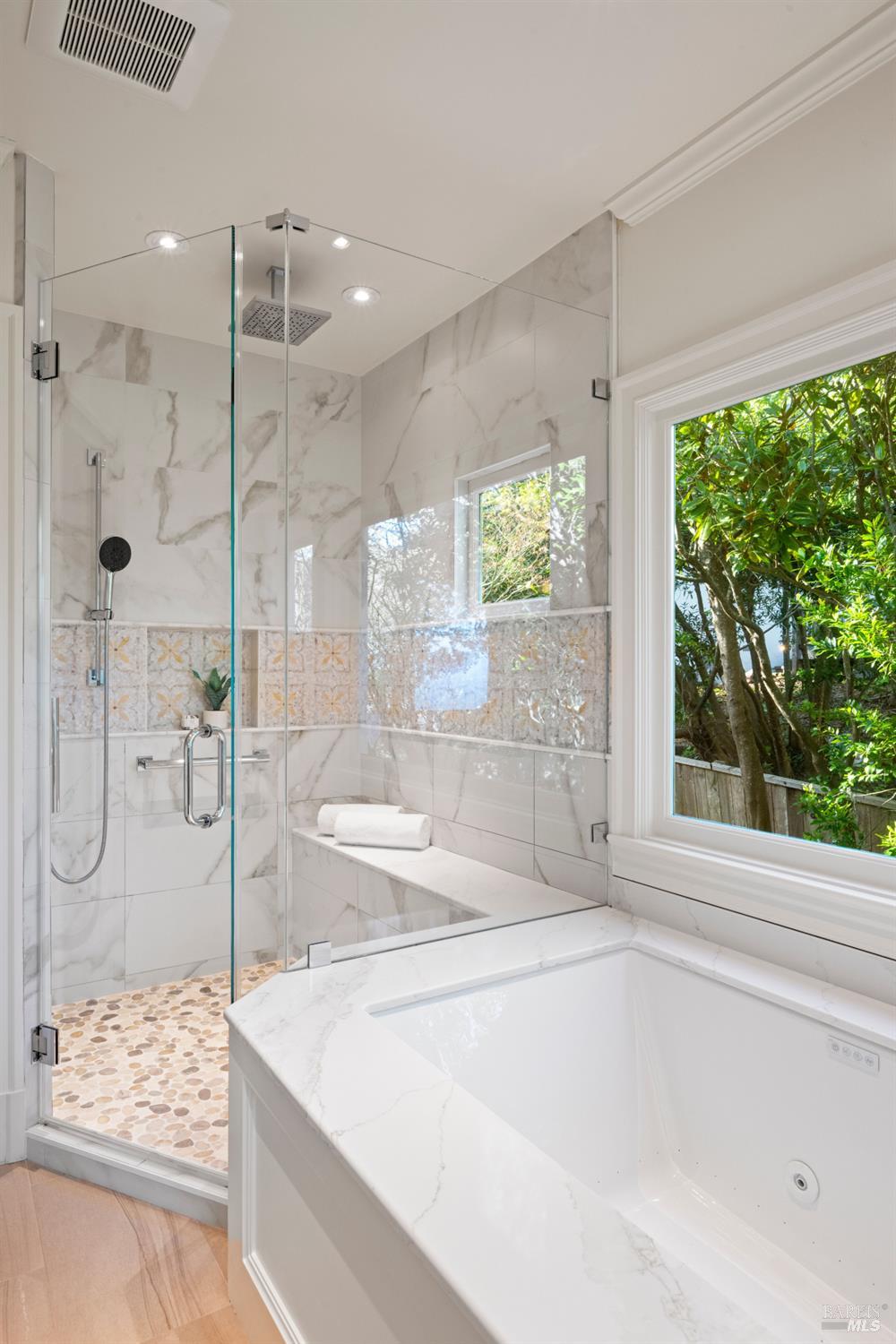 615 Sausalito Boulevard Sausalito, CA 94965 - Photo 35 of 45 a bathroom with a granite countertop sink and shower