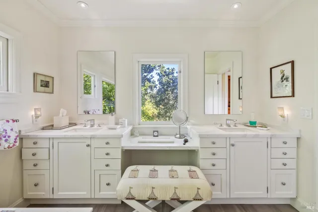 a living room with furniture rug and a large window