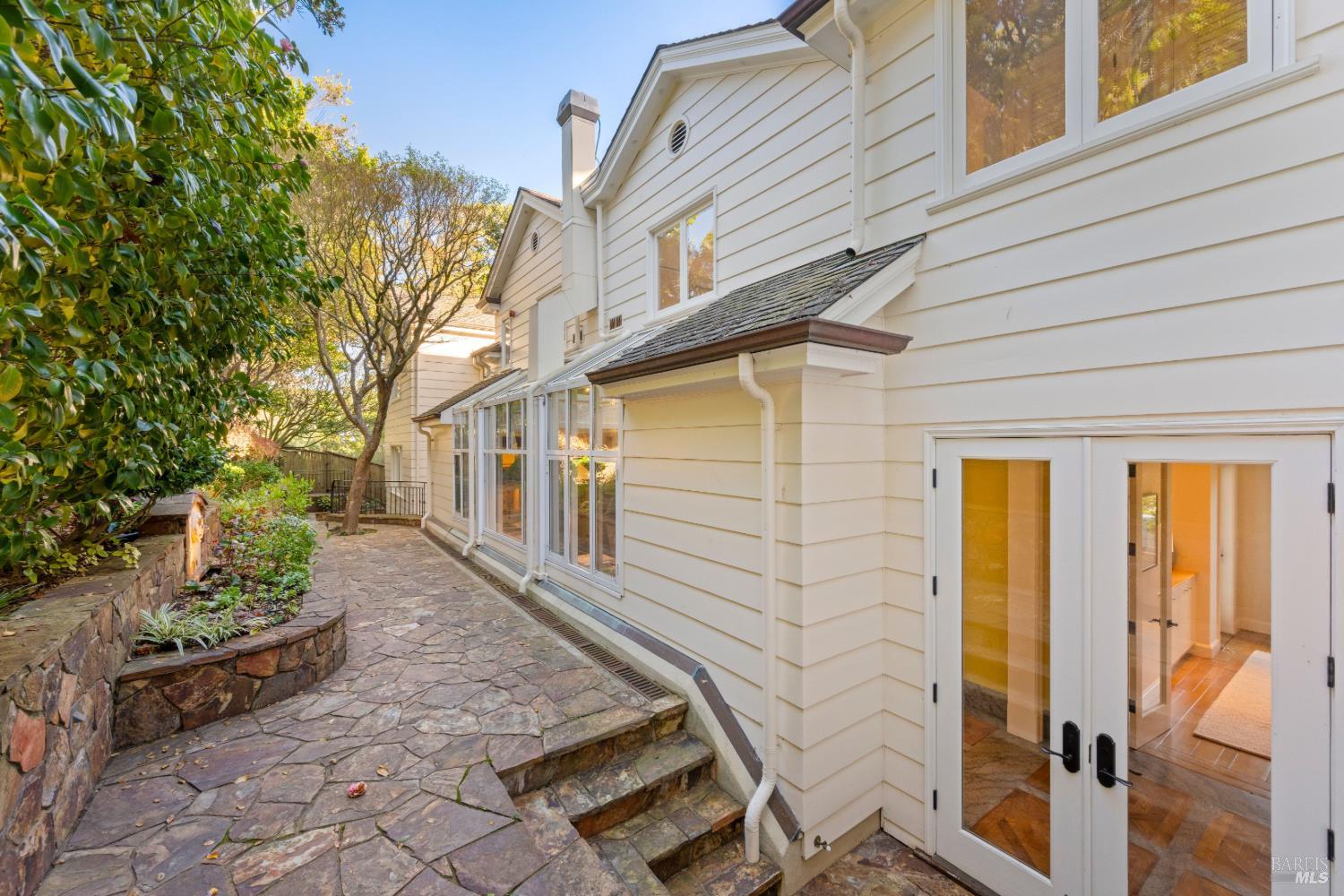 615 Sausalito Boulevard Sausalito, CA 94965 - Photo 7 of 45 a front view of a house with a yard