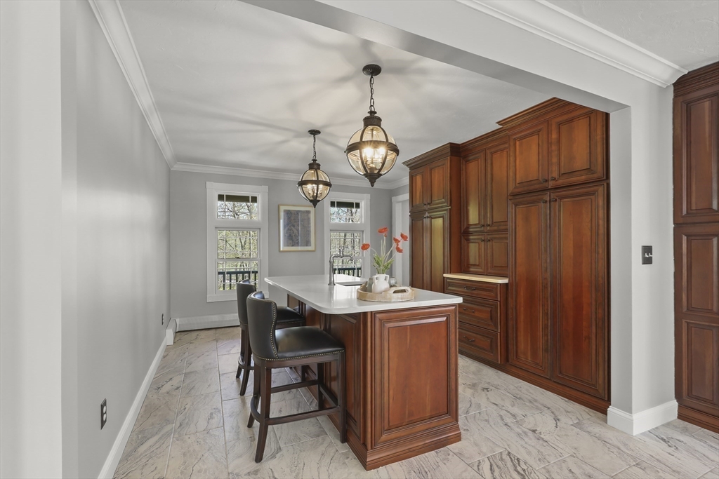 52 Fales Road Plainville, MA 02762 - Photo 13 of 41 a view of a dining room with furniture window and wooden floor