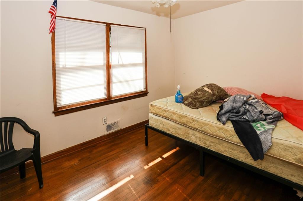 1368 West Austin Road Decatur, GA 30032 - Photo 13 of 42 a bedroom with a bed and a window