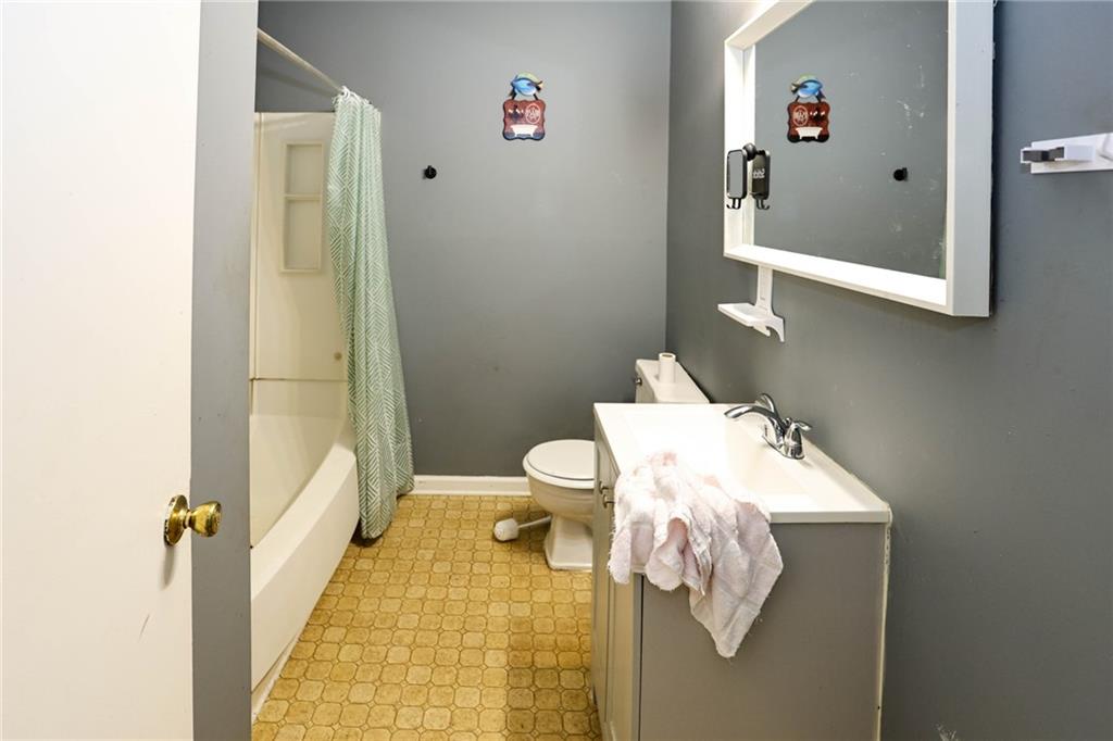 1368 West Austin Road Decatur, GA 30032 - Photo 15 of 42 a bathroom with a sink toilet and shower