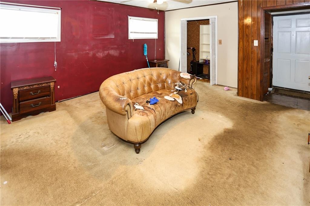 1368 West Austin Road Decatur, GA 30032 - Photo 25 of 42 a bedroom with a bed and a chair