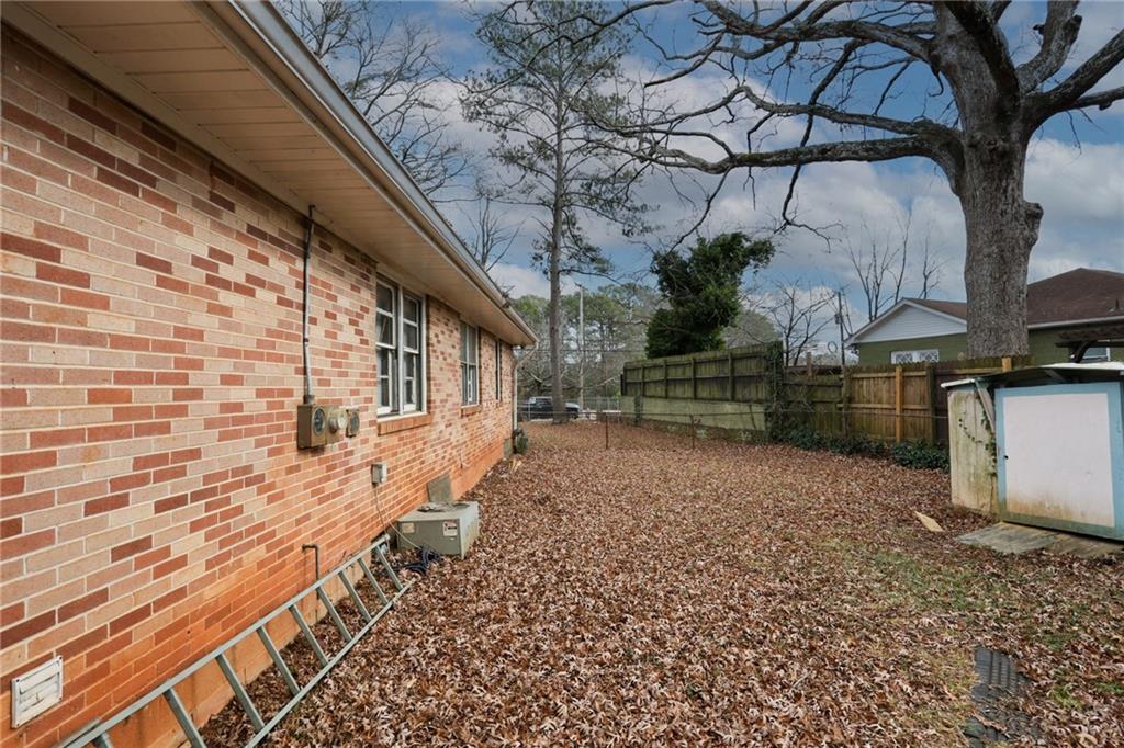 1368 West Austin Road Decatur, GA 30032 - Photo 34 of 42 a view of a house with a yard