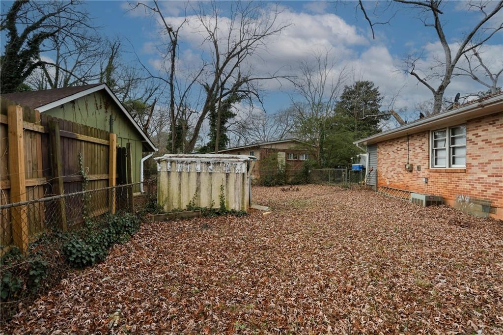 1368 West Austin Road Decatur, GA 30032 - Photo 37 of 42 a backyard of a house with lots of green space