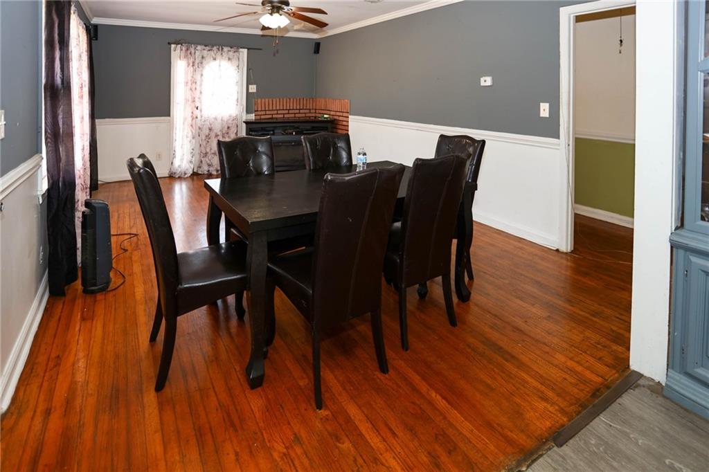 1368 West Austin Road Decatur, GA 30032 - Photo 5 of 42 a view of a dining room with furniture and wooden floor