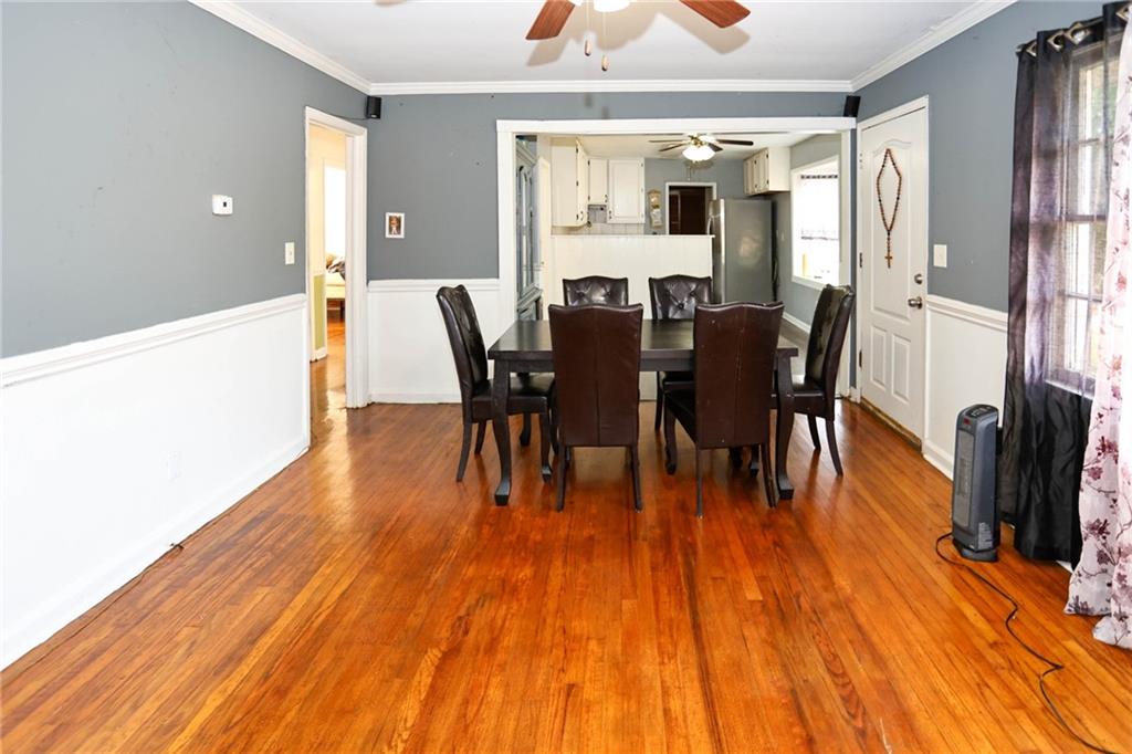 1368 West Austin Road Decatur, GA 30032 - Photo 9 of 42 a view of a dining room with furniture and wooden floor