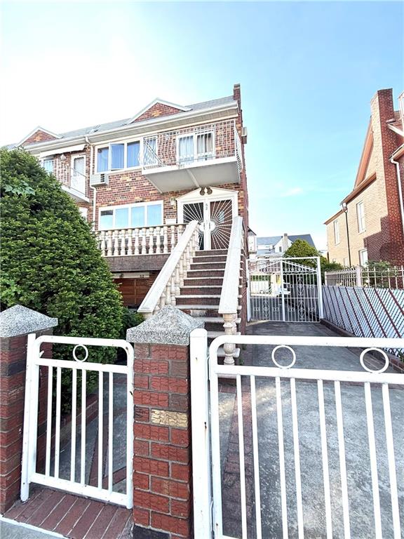 52 Bay 22nd Street Brooklyn, NY 11214 - Photo 2 of 20 a front view of a house with balcony